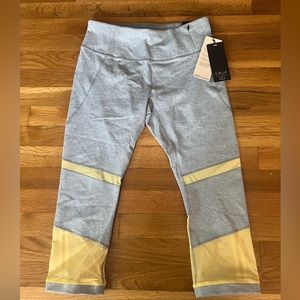 Calia Athletic Capri Leggings with mesh cut outs. Yellow and gray. Size Medium